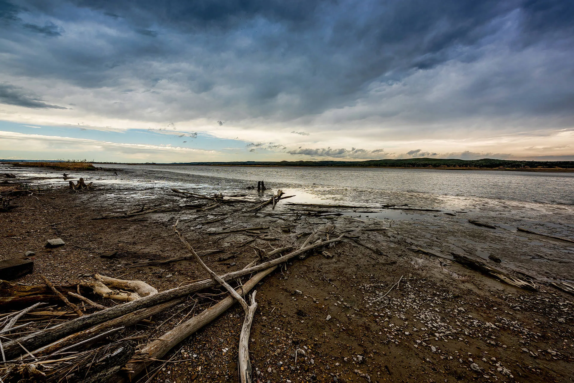 Image of Missouri National Recreational River at dusk with driftwood