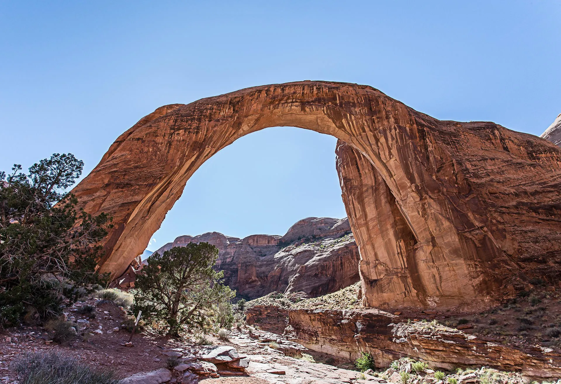 naturally carved arch in red rock