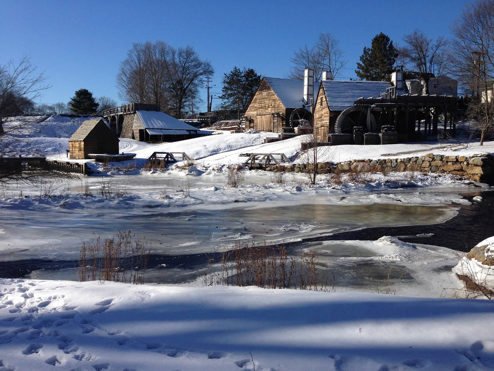 Saugus Iron Works buildings covered in winter snow