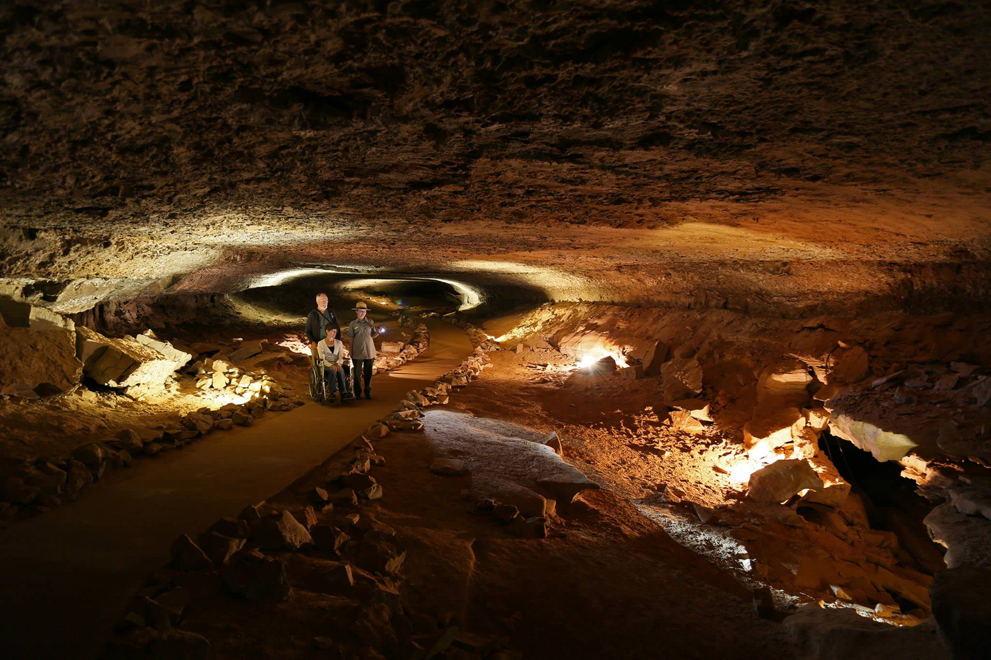 A family enjoys Mammoth Cave. 