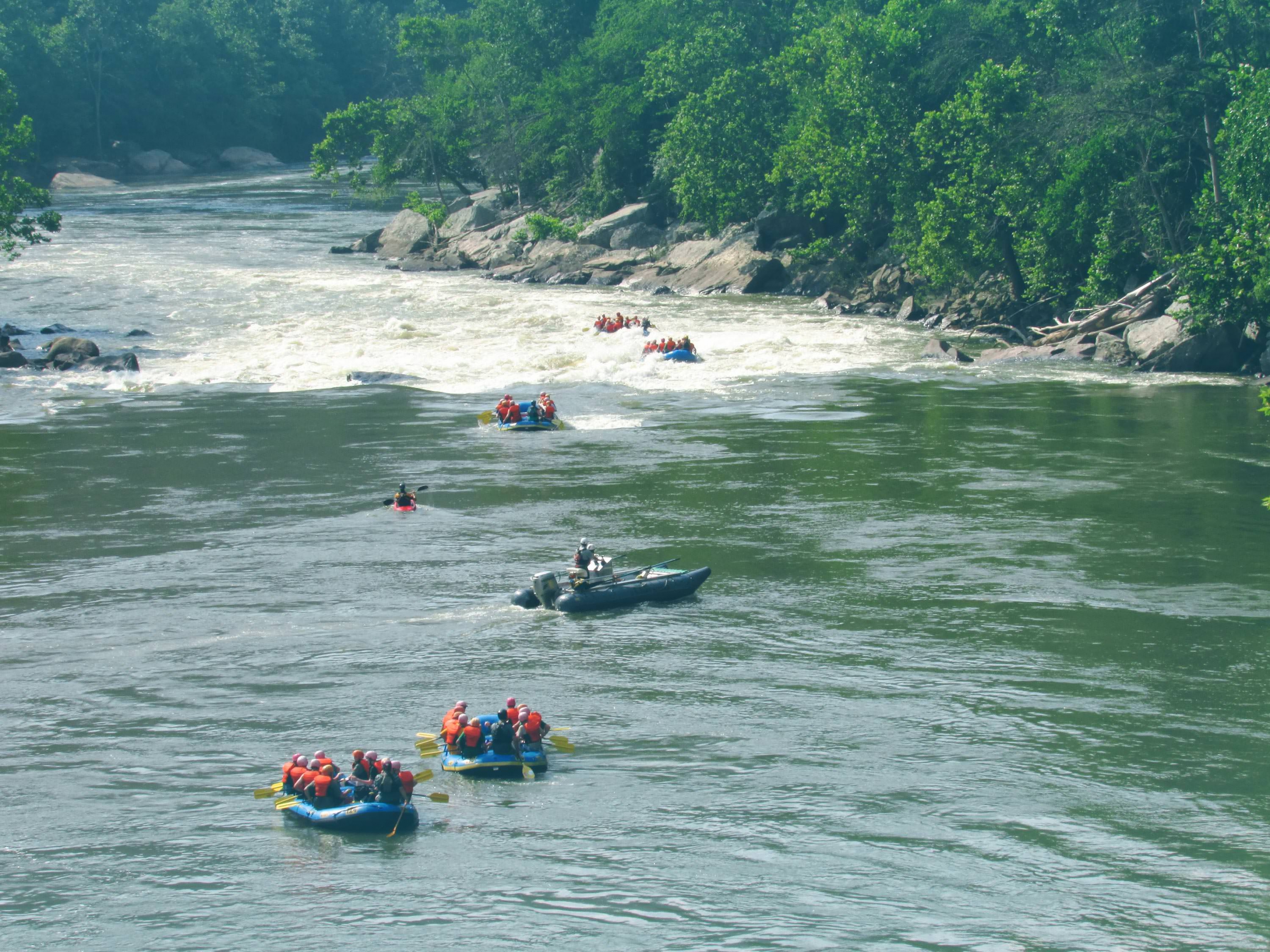 A group of rafters braves the New River Gorge.