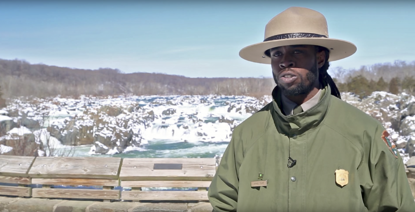 Ranger Ahmad Toure talking in a snowy Great Falls National Park
