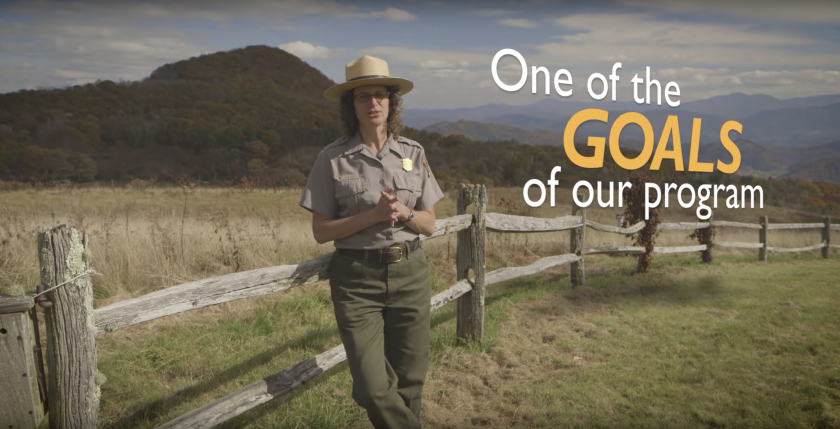 Park ranger talking outside with "one of the goals of our program" as overlay text